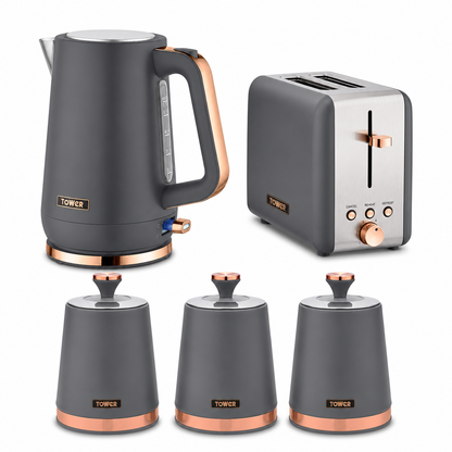 Grey countertop kitchen set with kettle, toaster, and three canisters, copper accents