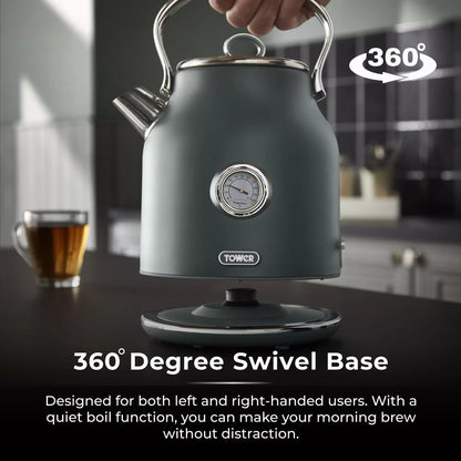 Forest green kettle on a 360-degree swivel base with chrome handle and spout
