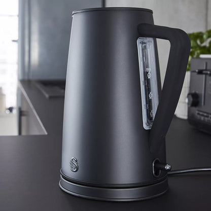 Matt black kettle with clear water level window and power base