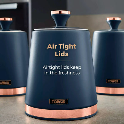 Midnight blue storage canister with rose-gold lid knob and copper base ring