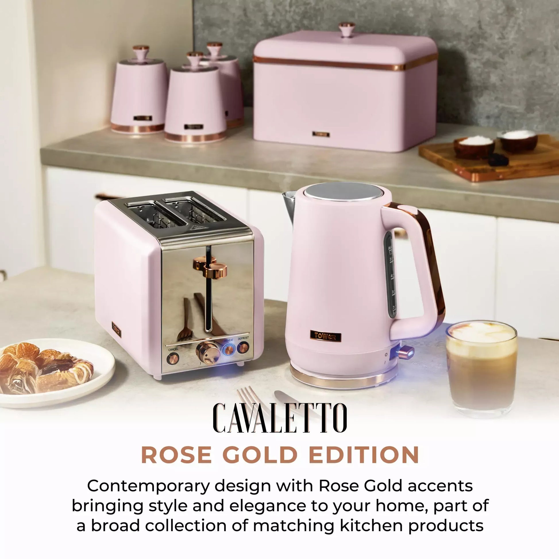 Marshmallow pink kitchen toaster and pyramid kettle set on a countertop