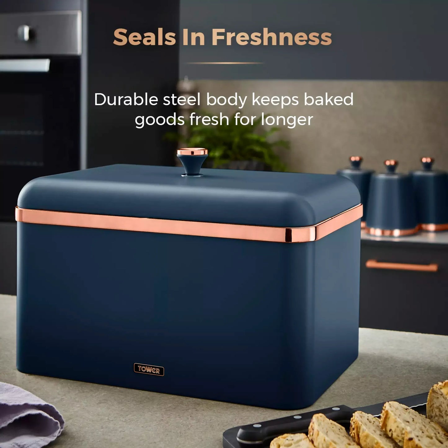 Midnight blue bread bin with rose-gold trim and sealed lid for freshness