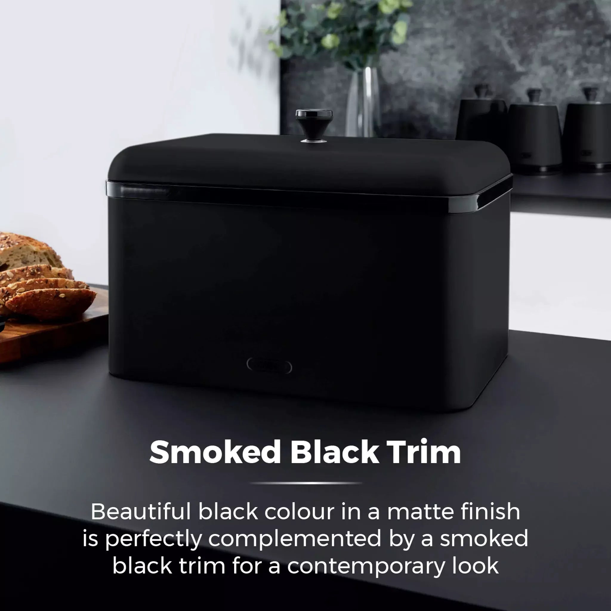 Black bread bin with smoked black trim on countertop