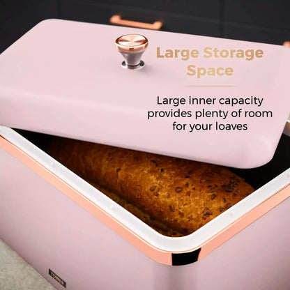Open marshmallow pink Tower Cavaletto bread bin showing loaves and rose-gold rim