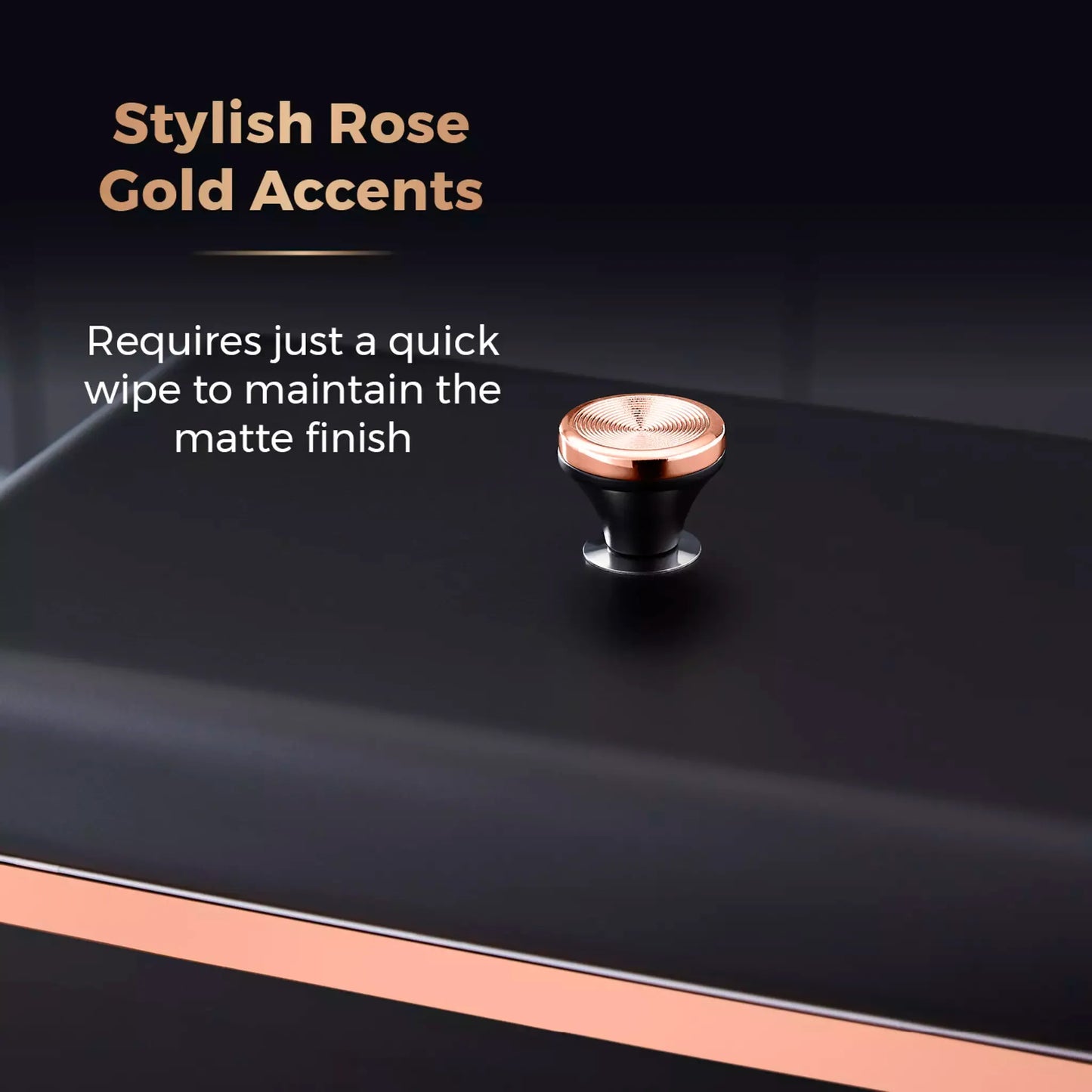 Rose-gold knob on black bread bin lid with matte finish