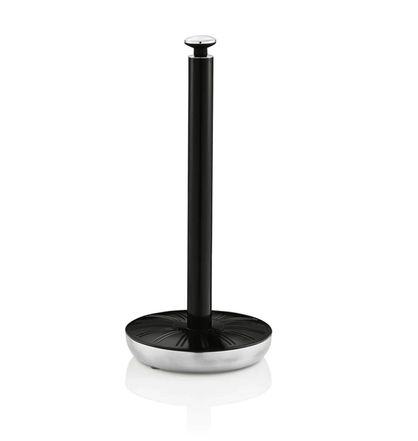 Black metal towel pole with round base and vertical center post