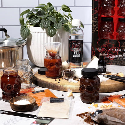 Thoughtfully DIY - Make Your Own Spicy BBQ Sauce DIY Gift Set - Includes 4 Mini Skull Shaped Reusable Bottles, Recipe Book, Gloves, 2 Funnels, Distilled White Vinegar, Peppers, Spices and Seasonings